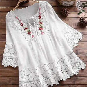 tunique fleurie en dentelle blanche