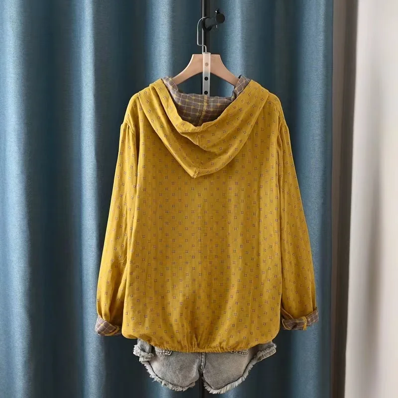 vêtement à capuche jaune pour femme